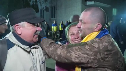 Moment Ukraine prisoners of war are reunited with families as 190 freed