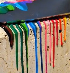 This girl walks across the city while giving it a colorful touch!