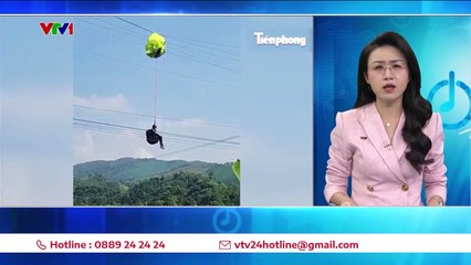 Cắt điện toàn xã để giải cứu vận động viên nhảy dù mắc kẹt trên dây diện - VTV24