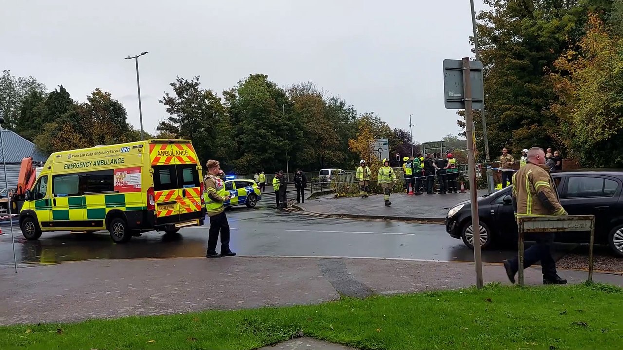Huge emergency response as car plunges into river