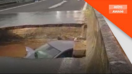 Kereta terjatuh akibat tanah jerlus