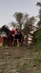 Horse Jumps Forward Throwing Woman As Shirt Gets Caught on Saddle Horn
