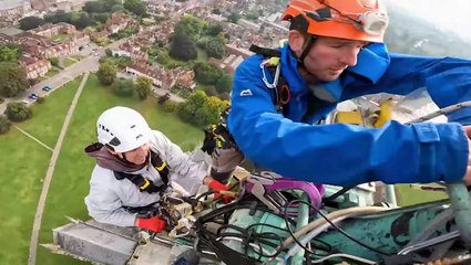 Worker scales UK’s tallest cathedral spire to change lightbulb at 400ft