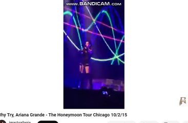 ariana grande playing with her mimu gloves