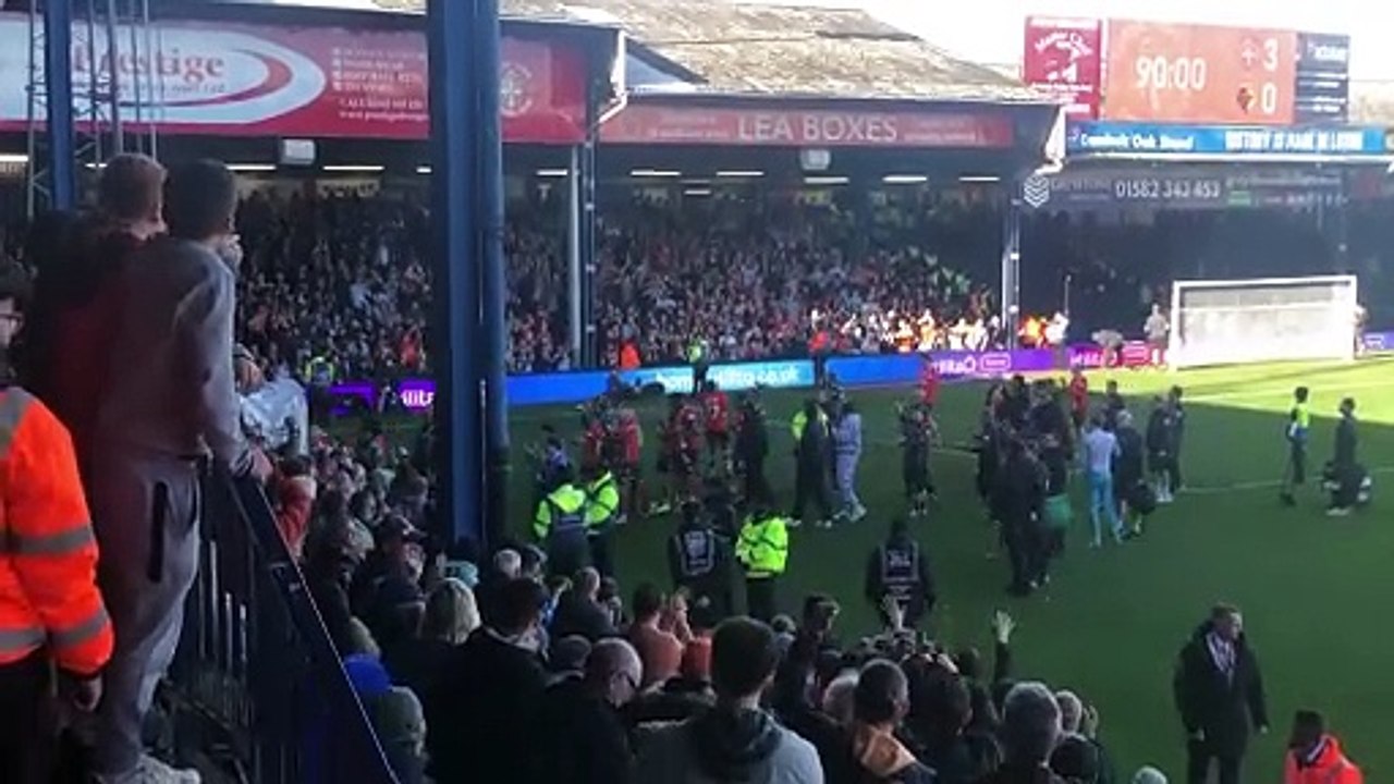 Luton players celebrate beating Watford