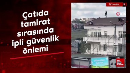 Başakşehir'de çatıda tamirat sırasında ipli güvenlik önlemi