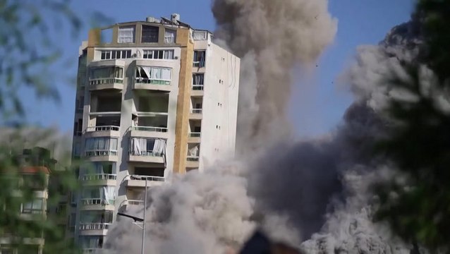 Moment Beirut building block collapses after Israel drops suspected 2,000lb bomb