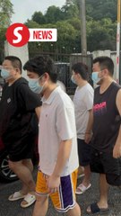 Eight Chinese nationals charged for operating fake investment call centre in Johor