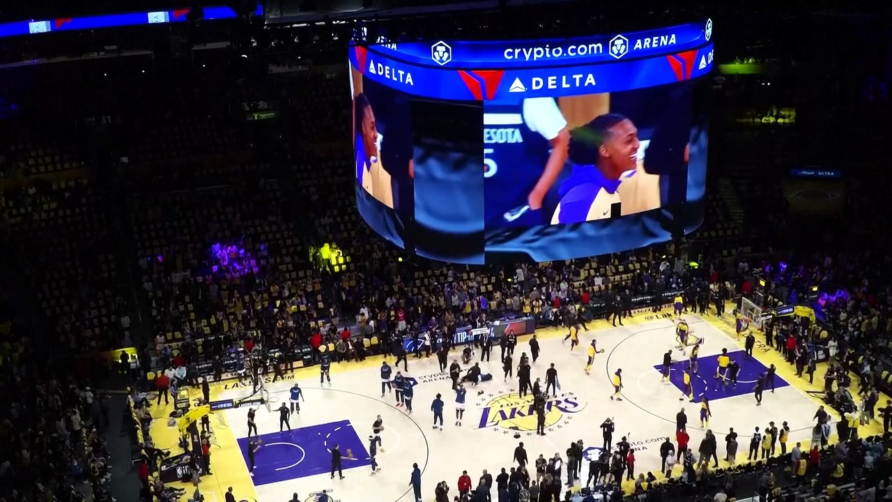 LeBron JAmes and Bronny James together, speaking with the media after making NBA history by playing together