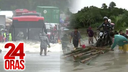 Pagdaan ng light vehicles sa bahagi ng Maharlika Highway sa Lopez, Quezon, ipinatigil muna dahil sa baha | 24 Oras