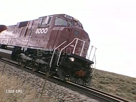 gettyimages-1322-190-640_adppTS, MS, CANTED, Train traveling through flat plains, Pueblo, Colorado, USA, - stock video