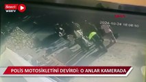 Ceza yazılan motosiklet sürücüsü polis motosikletini devirdi, o anlar kamerada