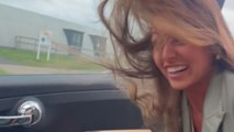 Woman (and her hair) blown away as Storm Isha hits the UK