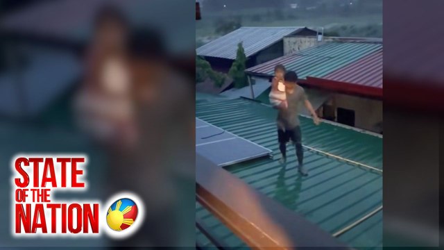 Mag-amang lumilikas sa baha, tumawid ng bubong ng kapitbahay | SONA