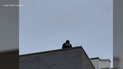 Police on flatblock rooftop amid domestic incident at St Mary's Island, Chatham