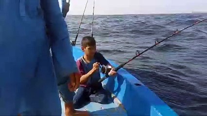 LITTLE ANGLER CAUGHT FISH  BARRACUDA/CHARNA ISLAND
