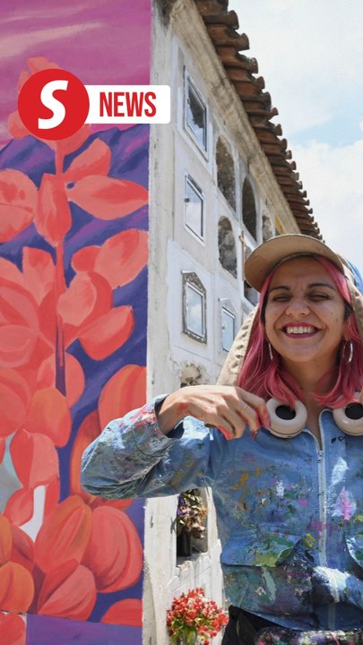 Colorful murals bring life to Bolivian cemetery ahead of Day of the Dead
