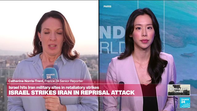 Israel says Hezbollah fired dozens of projectiles from Lebanon