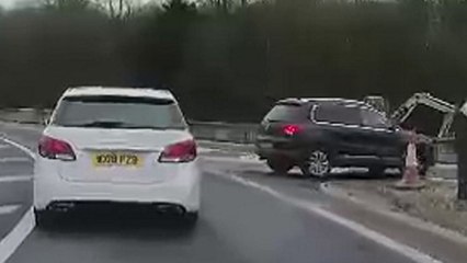 Motorist caught making illegal turn and travelling on the wrong side of the road