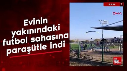Bursa'da evinin yakınındaki futbol sahasına paraşütle indi