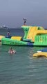 Man Slips and Falls off Large Floating Castle Into Sea