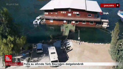Şanlıurfa'da polis su altında Türk Bayrağını dalgalandırdı