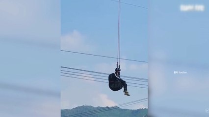 [나우쇼츠] 전선에 낙하산이 '대롱'...구조 위해 정전까지 / YTN