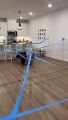 Dad uses painter's tape to turn the house into an obstacle course!