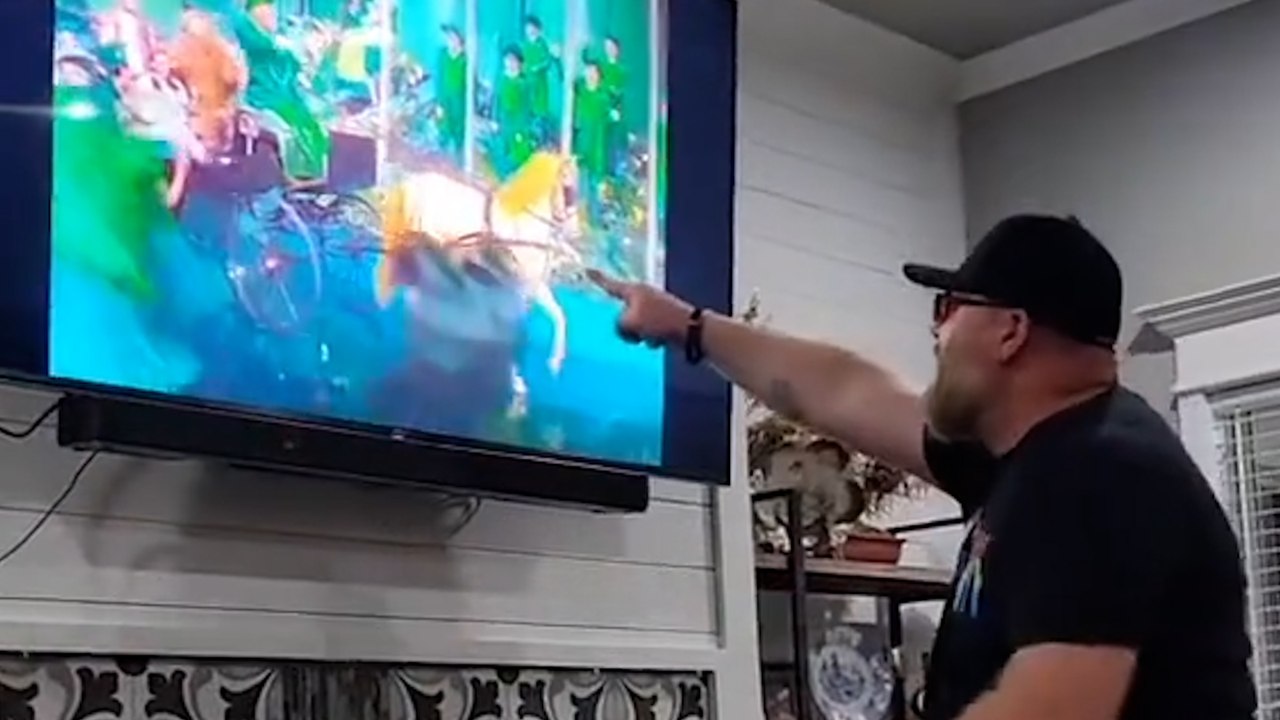 Man overwhelmed with emotions after trying colour blind glasses for first time