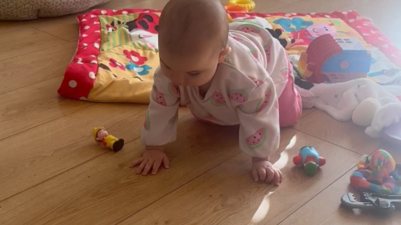 Unknown forces pull baby backward when she tries to crawl forward