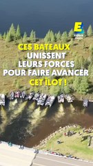 Ces bateaux unissent leurs forces pour faire avancer un îlot