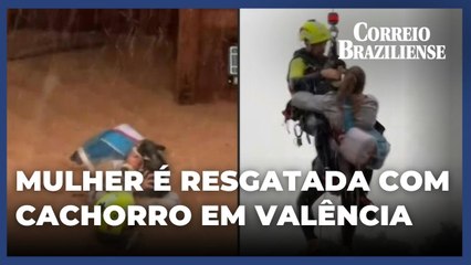 Mulher é resgatada com cachorro em Valência