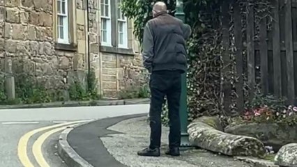 Hilarious footage of man struggling to stay upright after having a few too many drinks