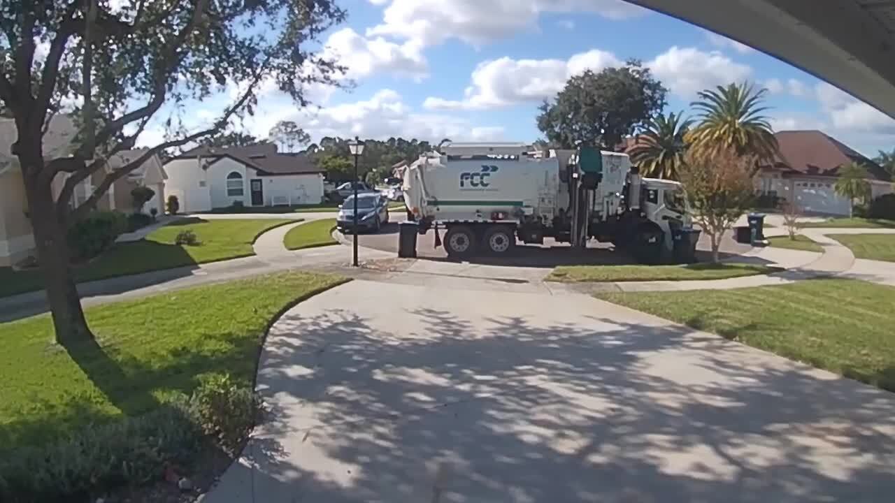 Garbage Truck Throws Trashcan