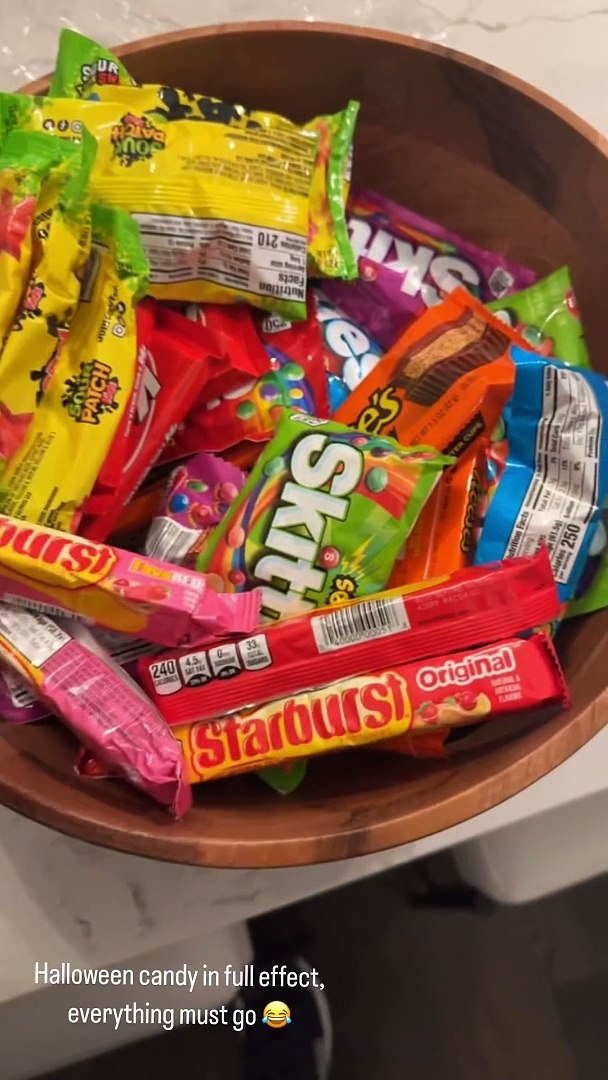 Jonathan Owens gets ready for Halloween preparing the candy for the ...