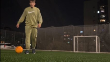 Hilarious fall: Boy tries to kick the football but falls backward