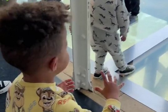 Watch toddler's adorable attempt to 'save' dad from falling through glass floor at Blackpool Tower