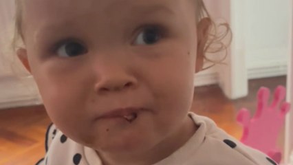 Adorable toddler tries sticky BBQ chicken and instantly regrets her decision