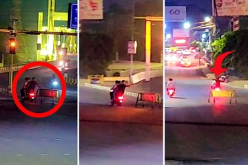 सड़क पर लगा बैरिकेड खींच ले गए ट्रिपलिंग करते हुड़दंगी