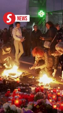 Serbia probes fatal train station roof collapse as vigil held for victims
