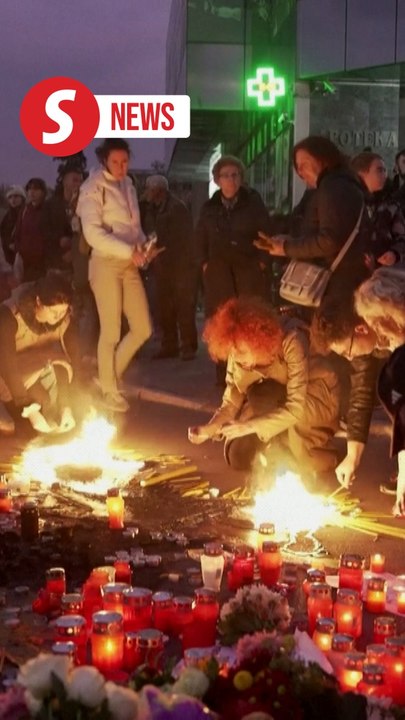 Serbia probes fatal train station roof collapse as vigil held for victims