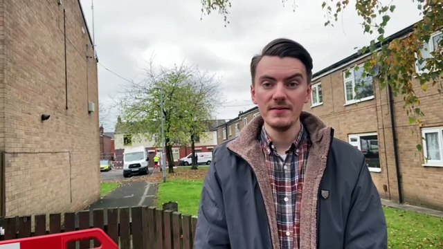 Reporter Sean Gleaves talks to neighbours affected by the suspected gas explosion in Gillett Steet, Preston