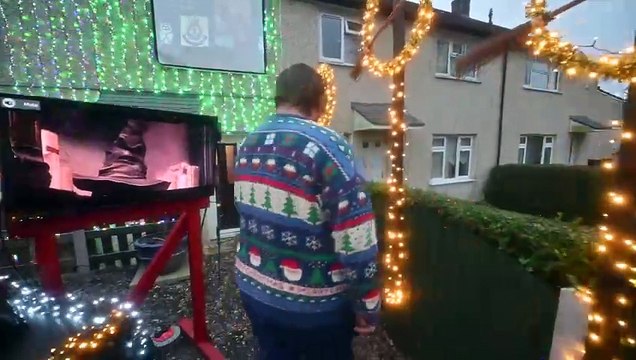 Giant Hogwarts train features in Dawley family Christmas lights display.