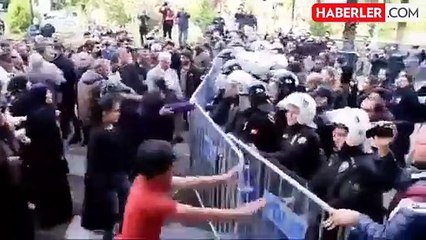 DEM Partililerin polis barikatlarına saldırdığı ana başörtülü kadın damga vurdu