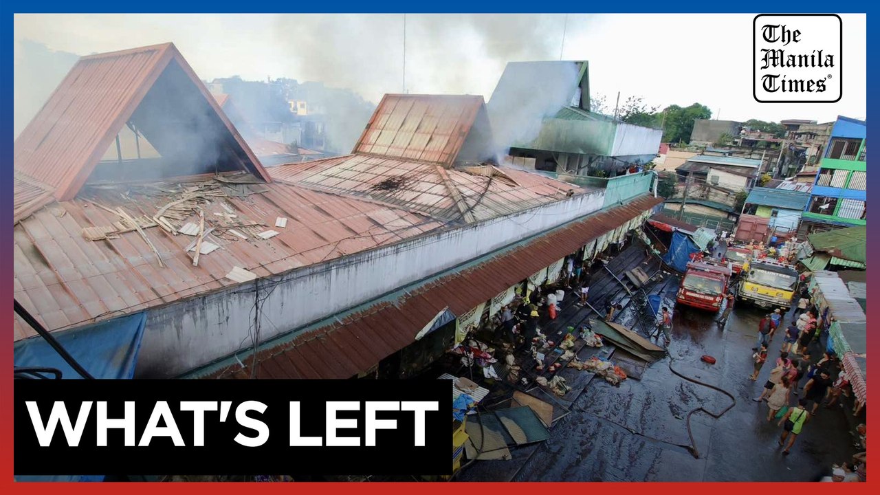 Vendors sort out salvageable items after Quezon City market fire