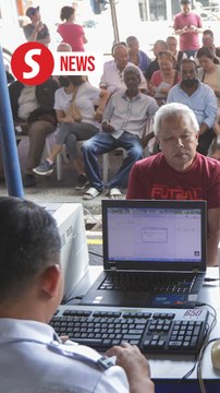 Huge crowds flock to KL traffic police station to pay summonses at 50% discount
