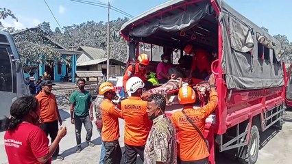 Thousands evacuated as Indonesian volcano eruption kills 10
