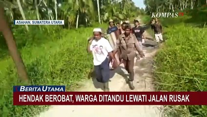 Hendak Berobat, Warga Asahan Sumut Harus Ditandu Lewati Jalan Rusak