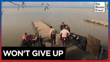 Spanish divers will search for missing after floods  'as long as it takes'