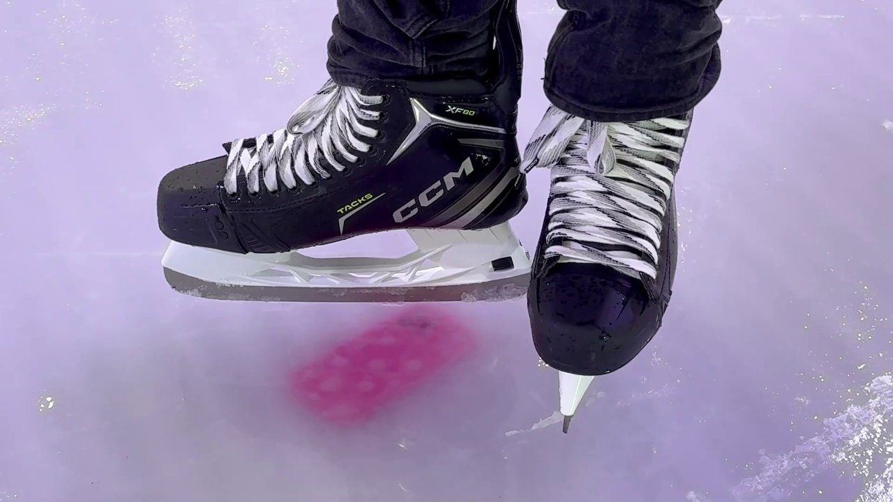 Workman loses ice-Phone in skating rink fail